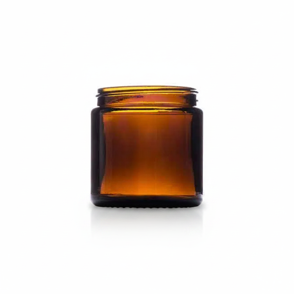 Amber glass jar on white background